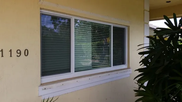 Impact windows and doors - attached window panels.