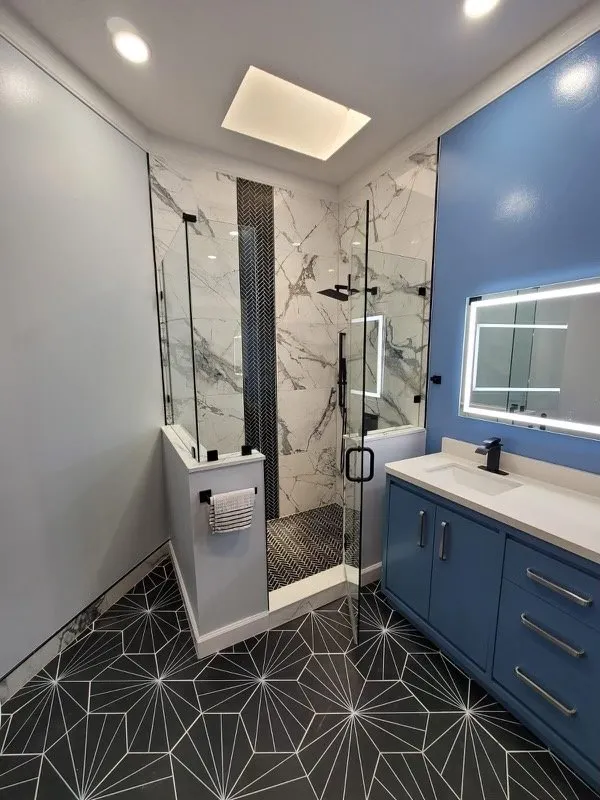 recently remodeled bathroom that has a neo-angle shower. Neo-angle shower, concept image.
